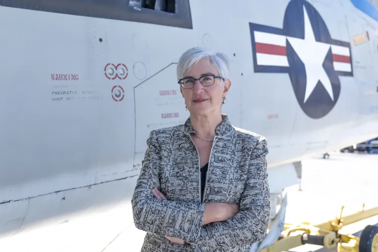 Photo of Elaine Charnov on Intrepid's flight deck. 