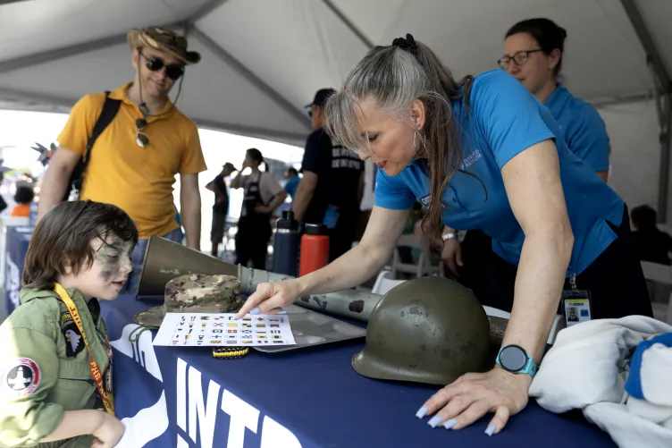 Visitors participating in Fleet Week activities on Pier 86 at the Intrepid Museum