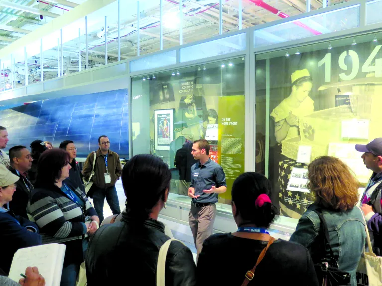 A tour guide with a group of visitors.