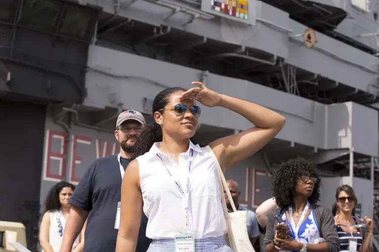 A group of educators at the museum participating in activities.