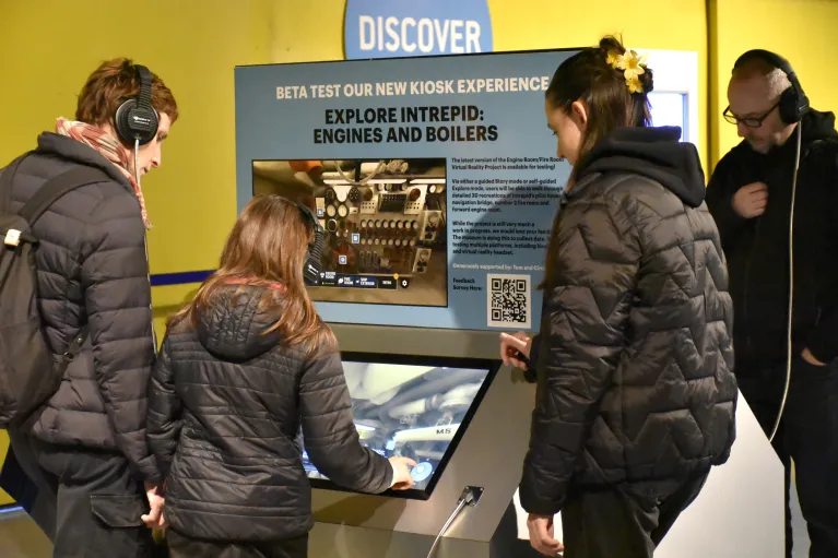 Visitor using virtual reality headset in the Intrepid Museum's Engine Room VR Experience