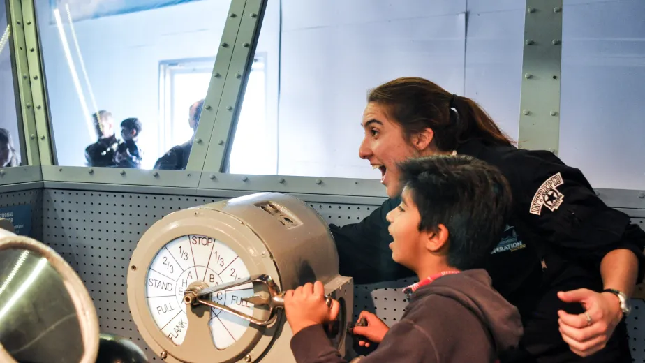 A mother and child are playing in the Museum's Exploreum.
